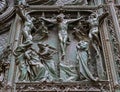 Detail of the Pieta scene in bas-relief at Milan`s Cathedral doors Royalty Free Stock Photo