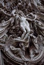 Detail of the Pieta scene in bas-relief at Milan's Cathedral doors, Royalty Free Stock Photo