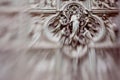 Detail of the Pieta scene in bas-relief at Milan's Cathedral doors, motion blur Royalty Free Stock Photo