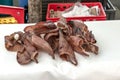 Detail of pig ears on stall at Farmer\'s Market in Kaiser-Josef-Platz