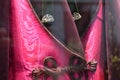 Detail of pink men`s dress exposed in the Dolce & Gabbana boutique.