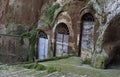 Pitigliano, one of the best town in Tuscany, Italy. Cellar doors in the medieval district. Royalty Free Stock Photo