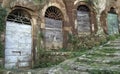 Pitigliano, one of the best town in Tuscany, Italy. Cellar doors in the medieval district. Royalty Free Stock Photo