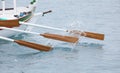 boat oars, with sea in the background