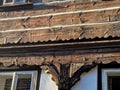 detail of a plinth, folk architecture, supporting element timbered, suppo Royalty Free Stock Photo