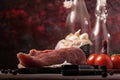 Detail of pork tenderloin and other ingredients on vintage board Royalty Free Stock Photo