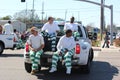 Detail prison workers in the back of a pick-up truck during Mardi Gras