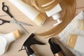 Detail of professional hair care products on wooden table top Royalty Free Stock Photo