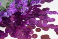 Detail of purple round sequins and purple dried flowers