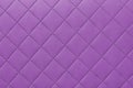 Detail of purple sewn leather, pink leather upholstery background pattern