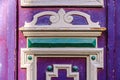 Detail from purple wooden door