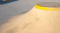 Detail of a ramp in a skatepark at sunset, skateboard concept Royalty Free Stock Photo