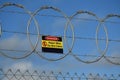 Detail of razorwire at industrial site Royalty Free Stock Photo
