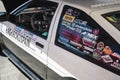 Detail of a rear window full of stickers of a Toyota Corolla Sprinter Trueno AE86