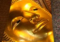 Detail of the Reclining Buddha at the Wat Pho temple, Bangkok. Royalty Free Stock Photo