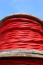 detail of red high-voltage electrical power cable spool