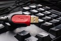 red USB cable on desktop computer keyboard background Royalty Free Stock Photo