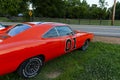 Detail of a replica of the General Lee Charger, from the television series The Dukes of Hazzard, parked along a country road