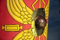 Detail of a reproduction Roman scutum shield with red and yellow