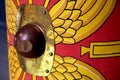 Detail of a reproduction Roman scutum shield with red and yellow