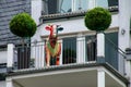 Detail of a residential building with cow statue on the balcony, Wiesbaden, Hesse, Germany