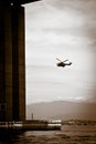 Detail of the Rio-Niteroi bridge with helicopter in background Royalty Free Stock Photo
