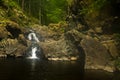 Detail of rocks with small waterfall at Black river gorge Royalty Free Stock Photo