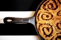 Detail of rolled bread buns with onion baked in pan