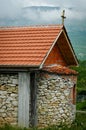 Orthodox red roofed stone church