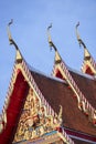 Detail of roof tiles with golden ornaments among the roof tiles of Buddhist temples