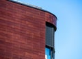 Detail of the rounded corner of a large building, abstract