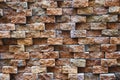 Rough brick wall with pattern of protruding bricks Royalty Free Stock Photo