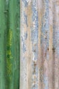 Detail of rustic green, brown and grey corrugated iron shed