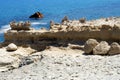 Rusting shipwreck at Sarakiniko on Milos island, Cyclades Islands, Greece Royalty Free Stock Photo