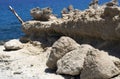 Rusting shipwreck at Sarakiniko on Milos island, Cyclades Islands, Greece Royalty Free Stock Photo