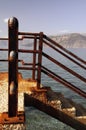 Detail of rusty railings by the sea Royalty Free Stock Photo