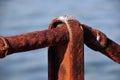 Detail of rusty railings by the sea Royalty Free Stock Photo