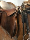 Detail of a saddle and stirrup.