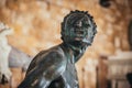 Detail from Satyr bronze statue 1575 of Giambologna, in Neptune fountain Piazza della Signoria, Florence Royalty Free Stock Photo