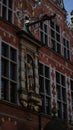 Detail with a sculpture of the Roman goddess Minerva on the Great Armory building in Gdansk