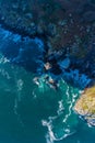 Detail of sea waves colors breaking in the coast of Lekeitio - drone view