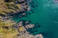 Detail of sea waves colors breaking in the coast of Sonabia, Cantabrian sea