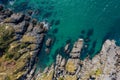 Detail of sea waves colors breaking in the coast of Sonabia, Cantabrian sea