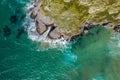 Detail of sea waves colors breaking in the coast of Sonabia, Cantabrian sea