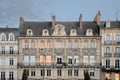 Detail of a second emperor style French building in evening light