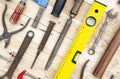 Detail of a set of joinery tools placed on a natural pine wood board