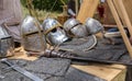 Detail of several medieval helmets helms, chainmail and shields a medieval armor knight Royalty Free Stock Photo