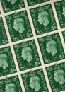 Detail from a sheet of halfpenny vintage postage stamps from the UK.