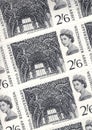 Detail from a sheet of mint half crown Westminster Abbey stamps from the UK.