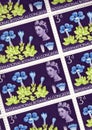 Detail from a sheet of vintage 3d postage stamps from the UK.